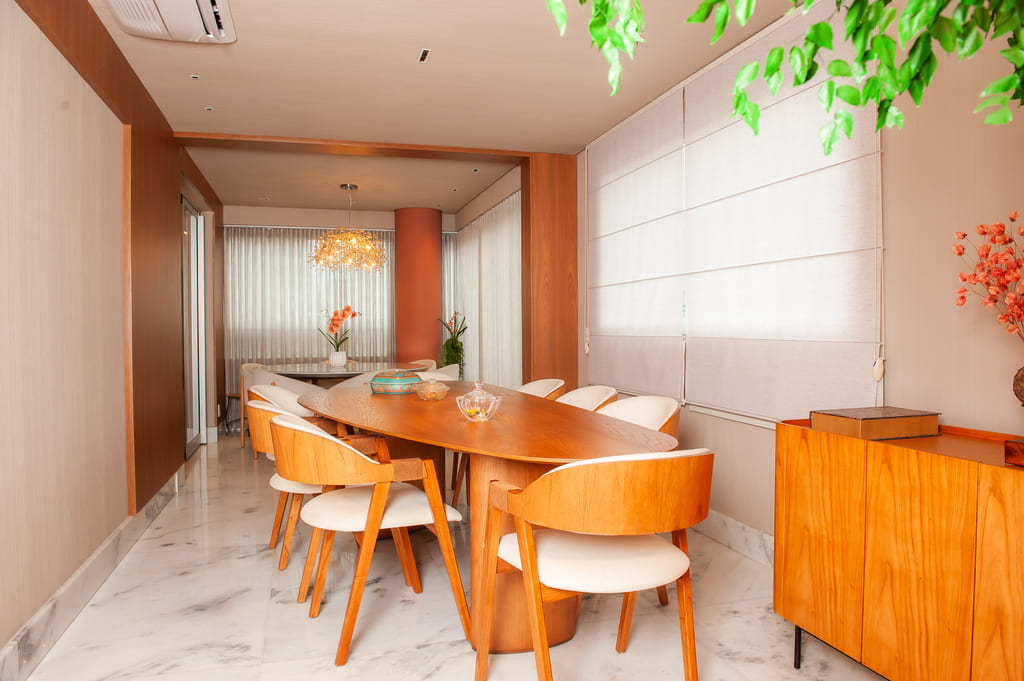 Sala reformada com design moderno e integração de ambientes no apartamento da Savassi, Belo Horizonte, projeto realizado pela Mazí Construtora.