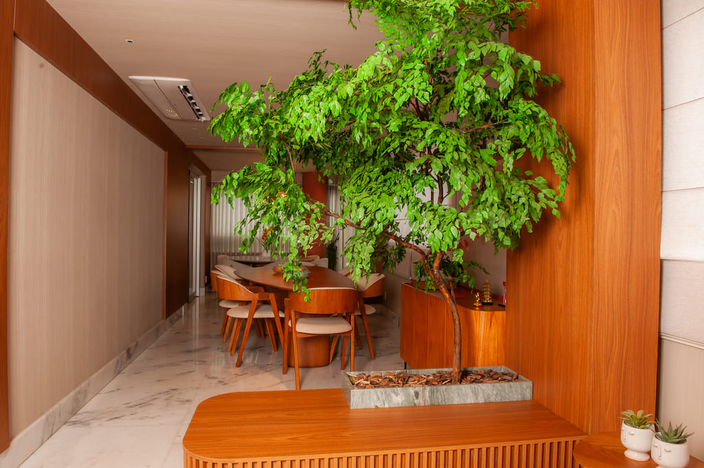 Sala reformada com design moderno e integração de ambientes no apartamento da Savassi, Belo Horizonte, projeto realizado pela Mazí Construtora.